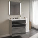 Curated Cartesian 24" x 7-1/2" x 21" and 24" x 15" x 21" three drawer vanity in tinted gray mirror glass with tip out drawer, slow-close plumbing drawer, full drawer and Engineered Stone 25" vanity top in Silestone lyra