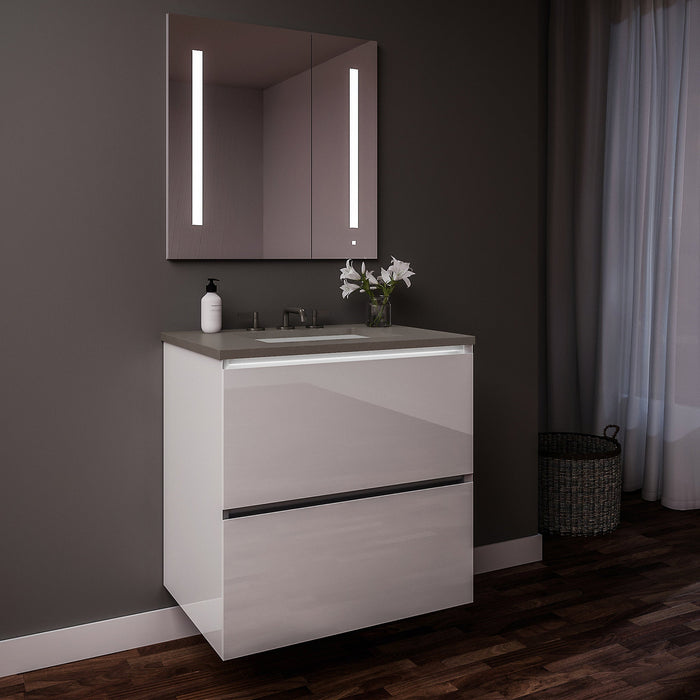 Curated Cartesian 30" x 15" x 21" two drawer vanity in white glass with slow-close plumbing drawer, full drawer, night light and Engineered Stone 31" vanity top in stone gray (Silestone expo grey)