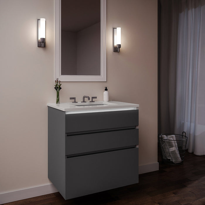 Curated Cartesian 30" x 7-1/2" x 21" and 30" x 15" x 21" three drawer vanity in matte gray glass with tip out drawer, slow-close plumbing drawer, full drawer, night light and Engineered Stone 31" vanity top in quartz white (Silestone white storm)
