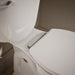 KOHLER K-36593-BN Covert ReadyLatch® Quiet-Close™ Elongated Toilet Seat, White - Shows close up detail of product in room