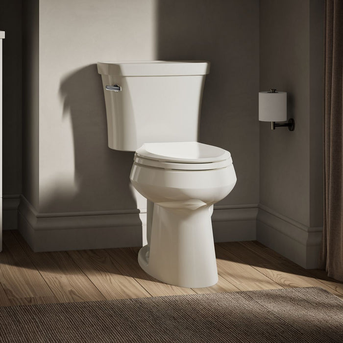 KOHLER K-3949-UT Highline Two-piece Elongated Toilet, 1.28 GPF, Biscuit - image focused on single product story