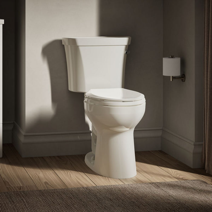 KOHLER Highline Comfort Height Two-Piece Elongated 1.28 GPF Toilet in White (K-43999-RA-0) - Biscuit