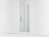 KOHLER K-707506-L Revel Pivot shower door, 74" H x 27-5/16 - 31-1/8" W, with 5/16" thick Crystal Clear glass, anodized...