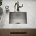 KOHLER K-RH20908-1 Lyric 15" Top-/under-mount Single-bowl Bar Sink, Stainless Steel - Shows close up detail of product in roo