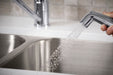 Sterling Valton Single-handle kitchen sink faucet with sidespray - Polished Chrome
